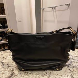 Unique Coach leather bag with brass details